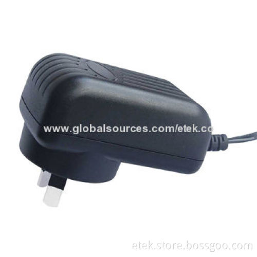 12W 12V 1A EU/US/AU/BS Switching Adapter with Over-voltage and Over-current Protections EN60950